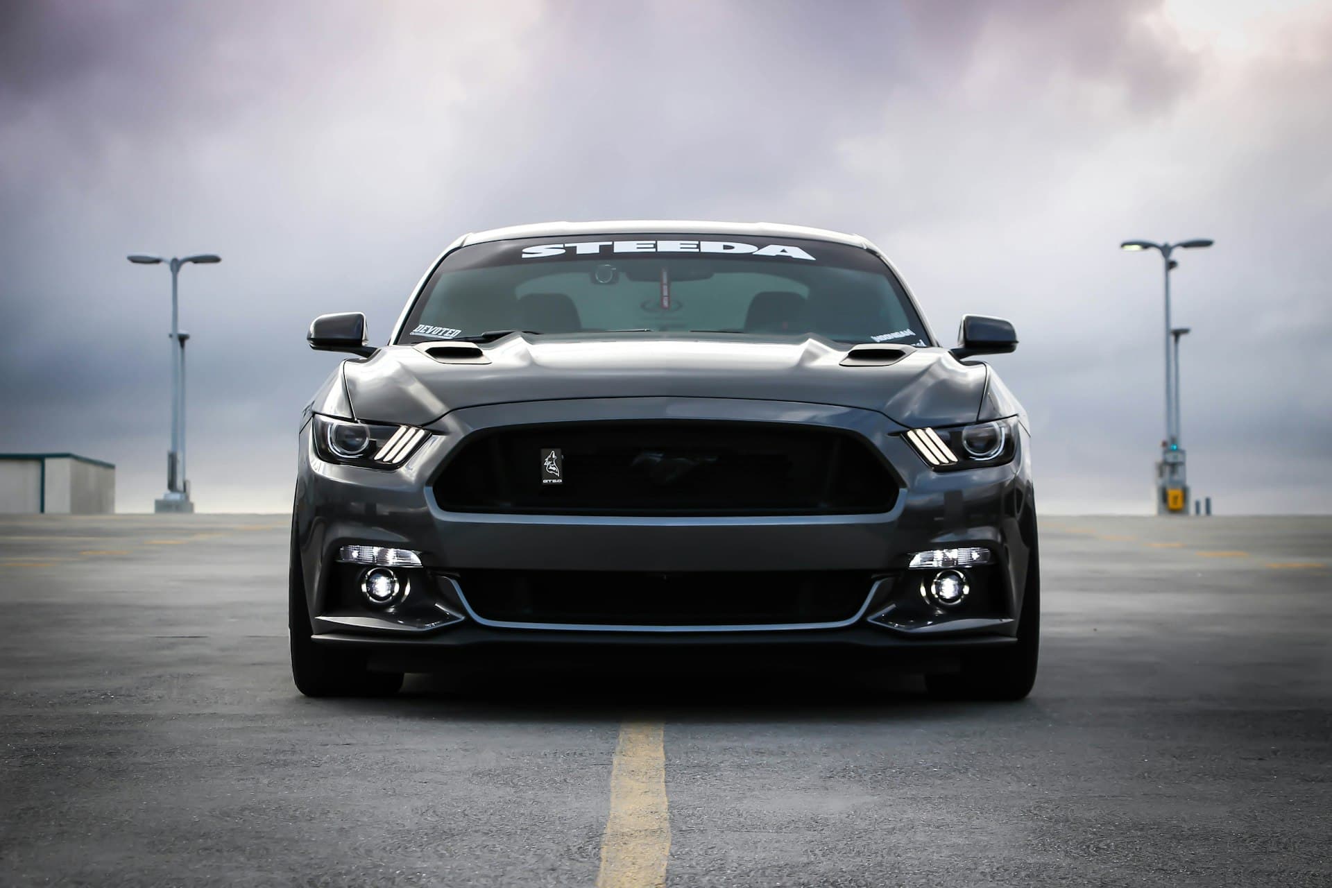 Professional window tinting on a luxury vehicle